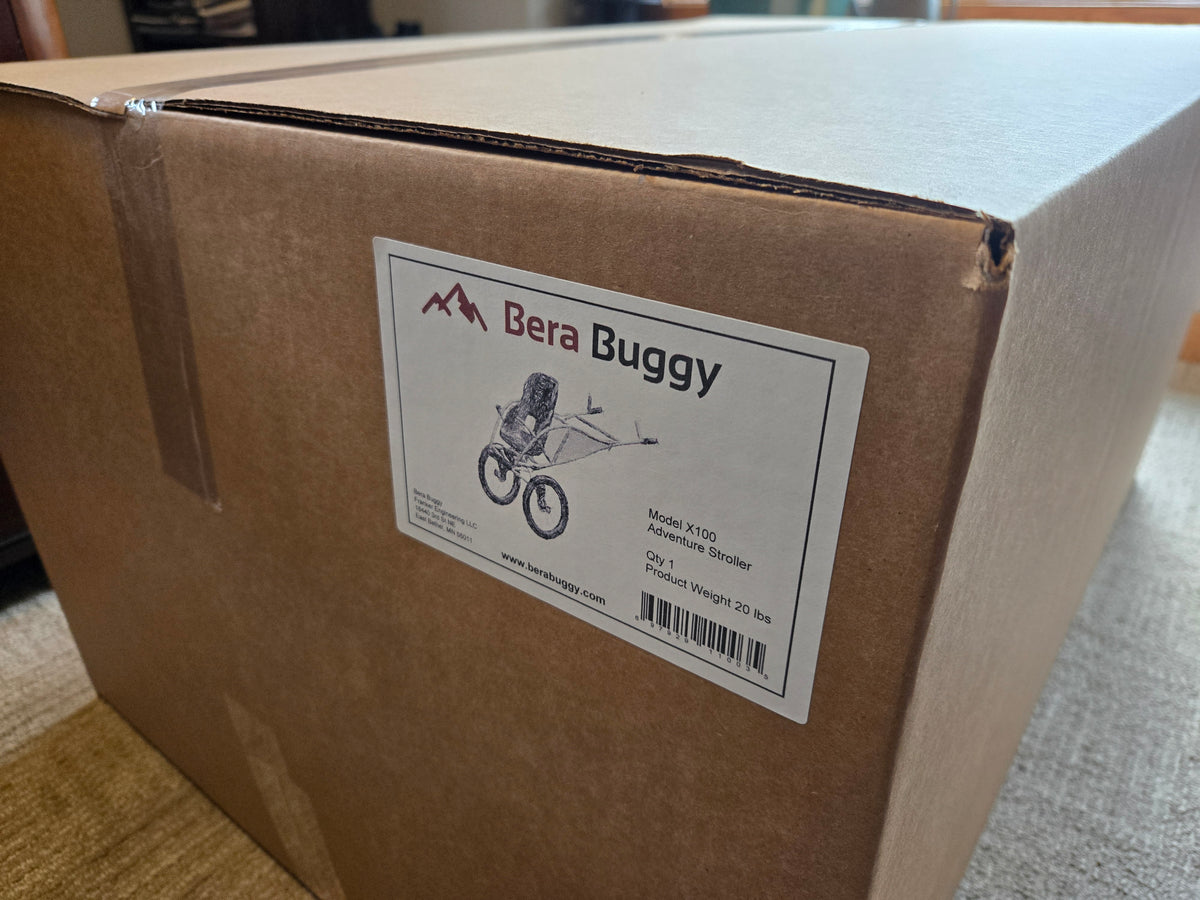 The Bera Buggy X100 shipping box with branded label